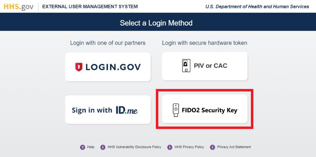 XMS login page with the 'FIDO 2 Security Key' login button highlighted
