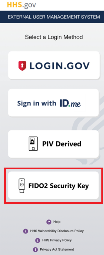 XMS mobile login page with the 'FIDO 2 Security Key' login button highlighted